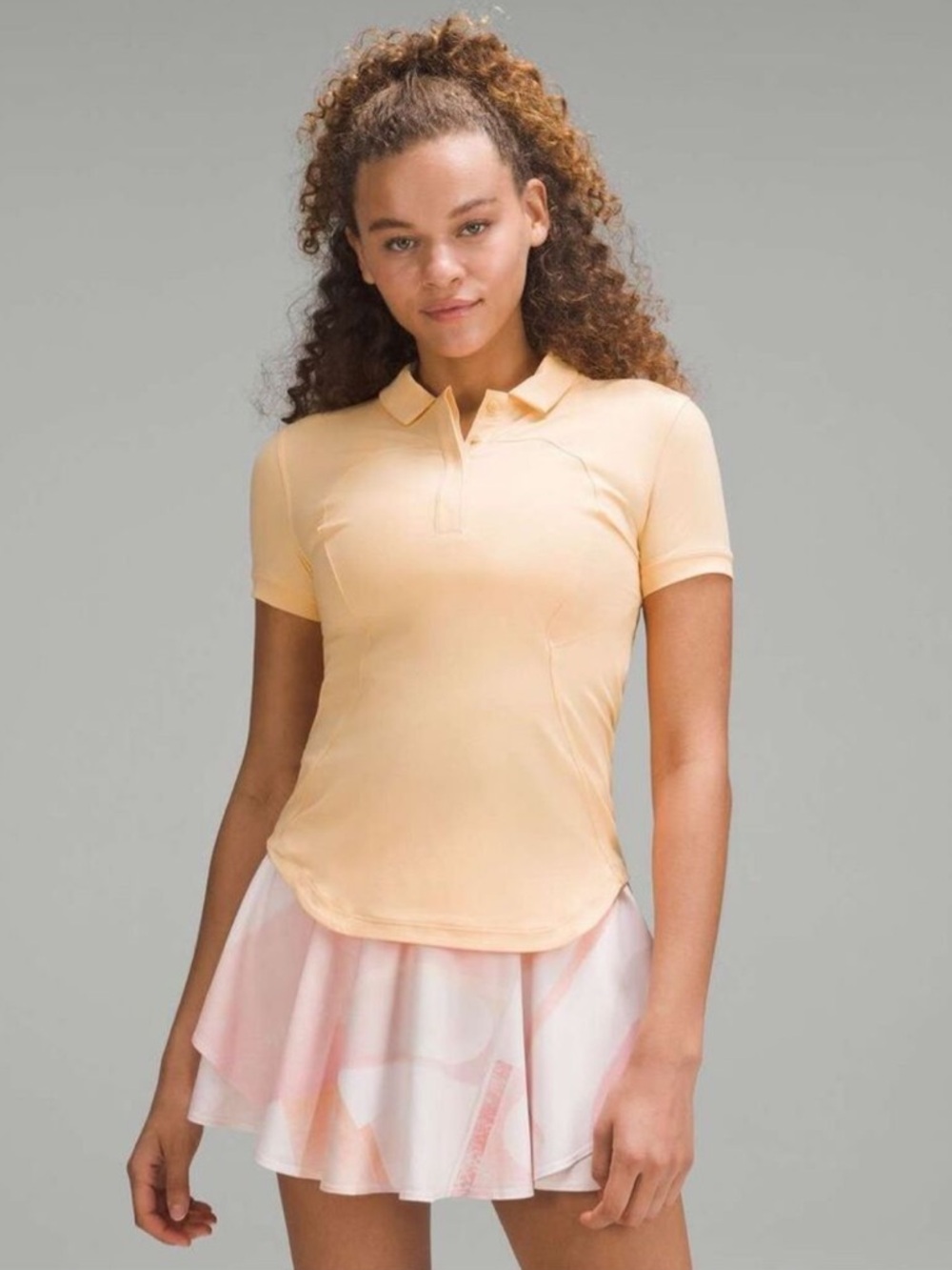 Lululemon Quick-Drying Short Sleeve Polo Shirt in SUMMER GLOW Creamsicle Size 6